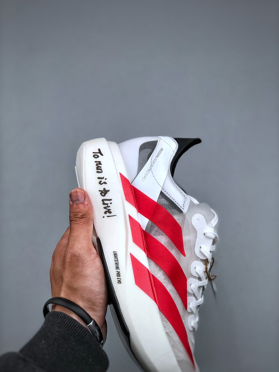 Adidas Adizero Evo: Ultralight, Breathable Running Shoes for Peak Performance 7 cmp i1745960534446 360 0 5