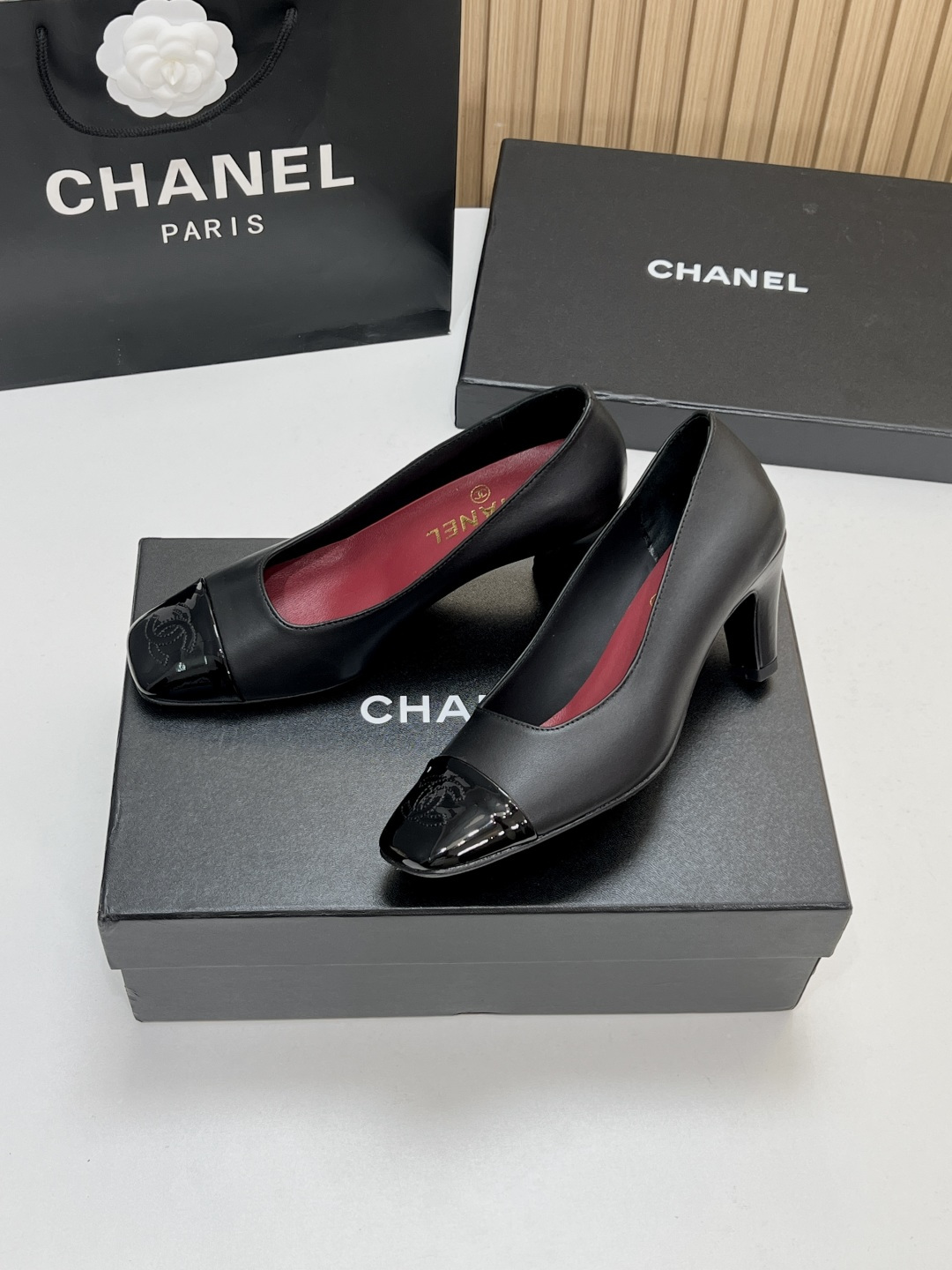 Chanel Black Cap-Toe Pumps