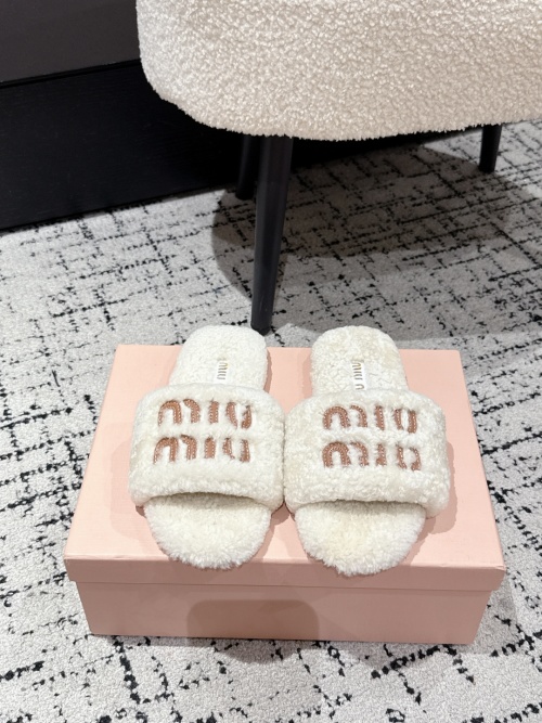 Miu Miu Women's Shearling Logo Slide Slippers, Cozy and Stylish for Fall/Winter 1 Miu Miu Women's Shearling Logo Slide Slippers, Cozy and Stylish for Fall/Winter