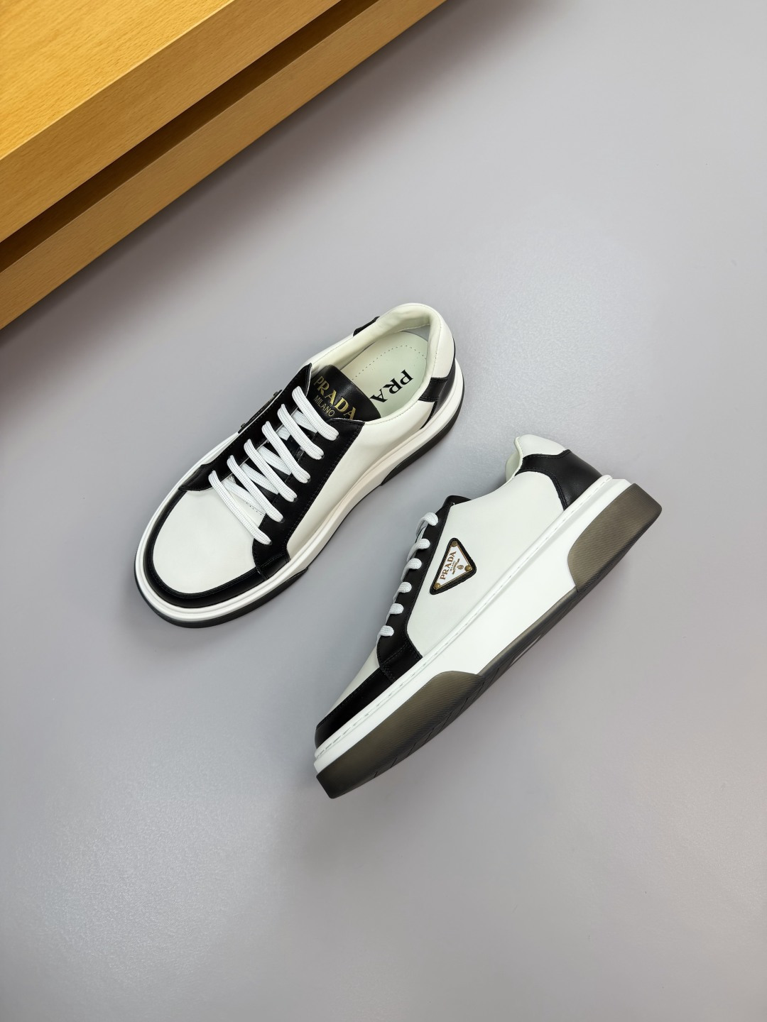 Prada Leather Sneakers with Metal Logo Detail - Casual Comfort & Style 3 cmp i1760287094570 5269 0 2
