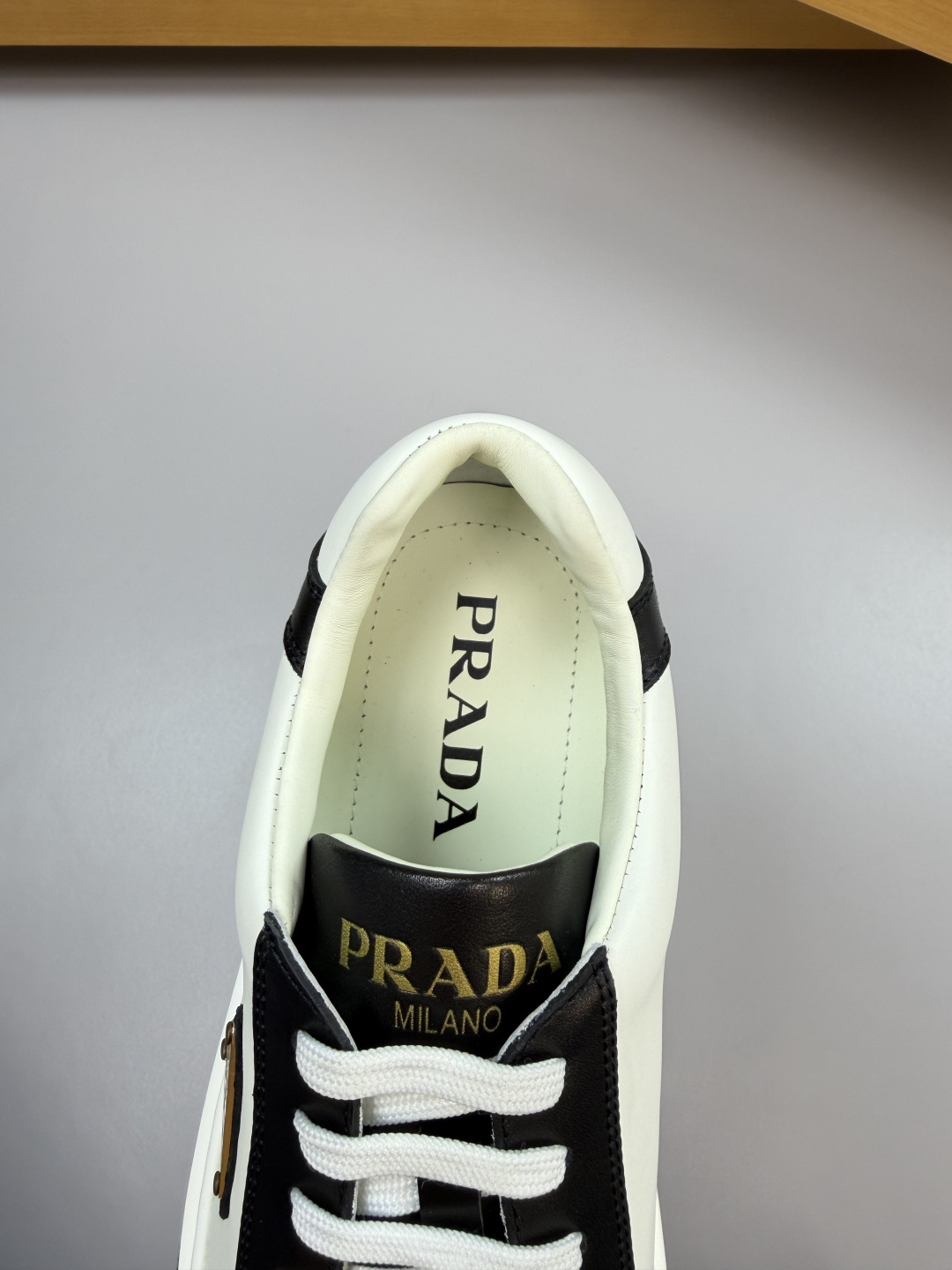 Prada Leather Sneakers with Metal Logo Detail - Casual Comfort & Style 7 cmp i1760287096498 6891 0 6