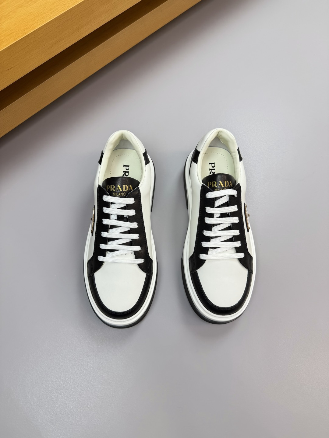 Prada Leather Sneakers with Metal Logo Detail - Casual Comfort & Style 2 cmp i1760287097157 7877 0 1