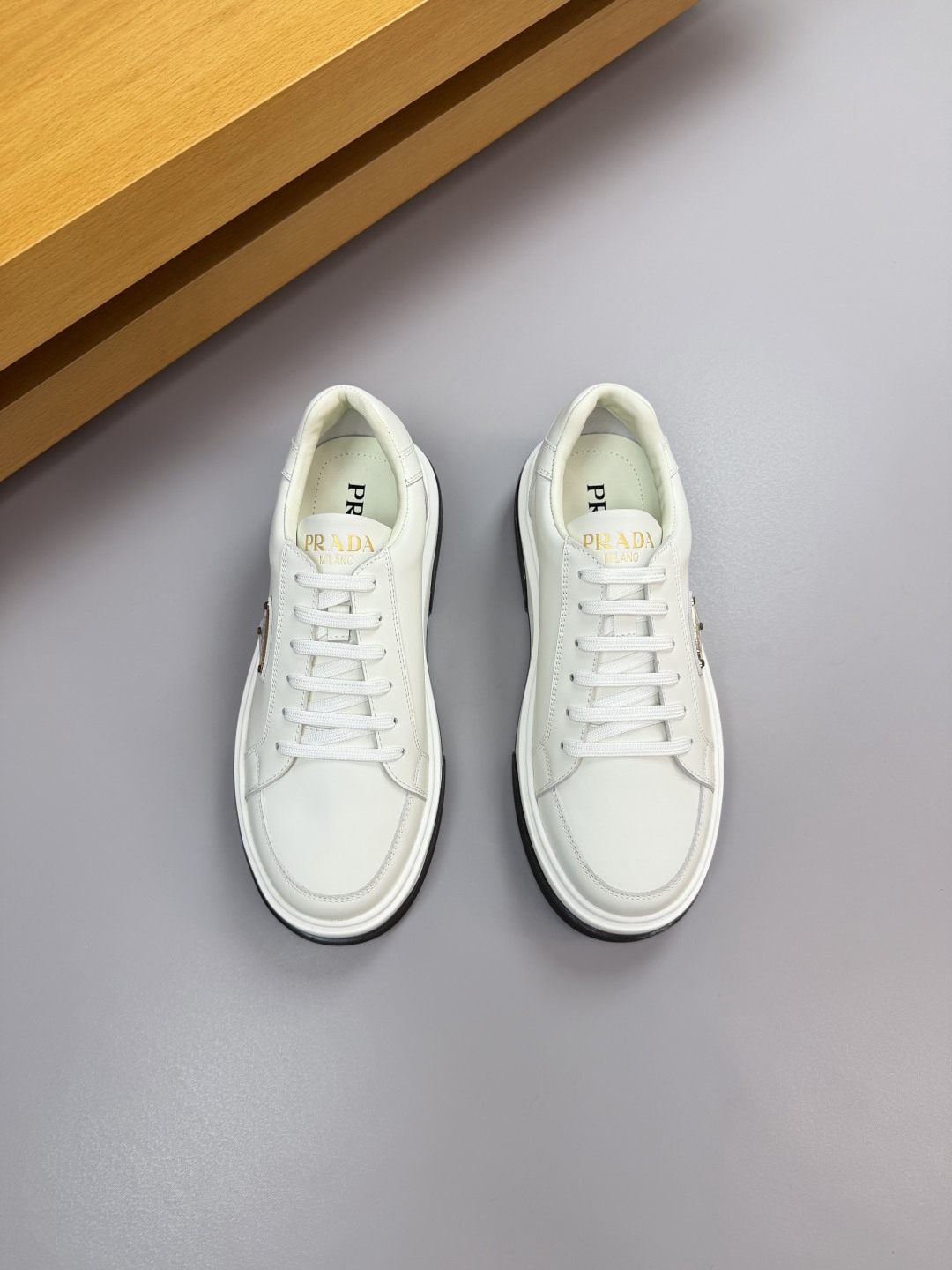 Prada White Nappa Leather Sneakers with Metal Logo - Casual and Comfortable 3 cmp i1760287149176 9580 0 1