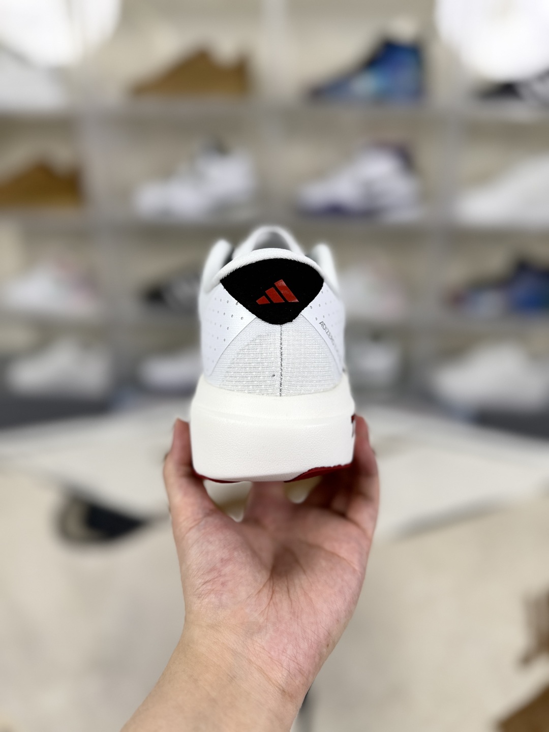 Adidas Adizero Evo SL Texas Tech Running Shoes - White, Black, and Red 4 cmp i1750532328039 9476 0 2