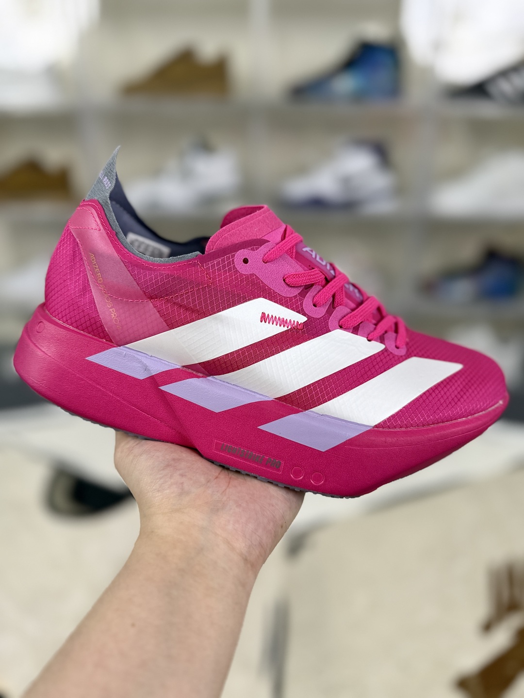 Adidas Adizero Adios Pro 4: Comfortable, Shock-Absorbing Pink Running Shoes 2 cmp i1752781338206 6567 0 0