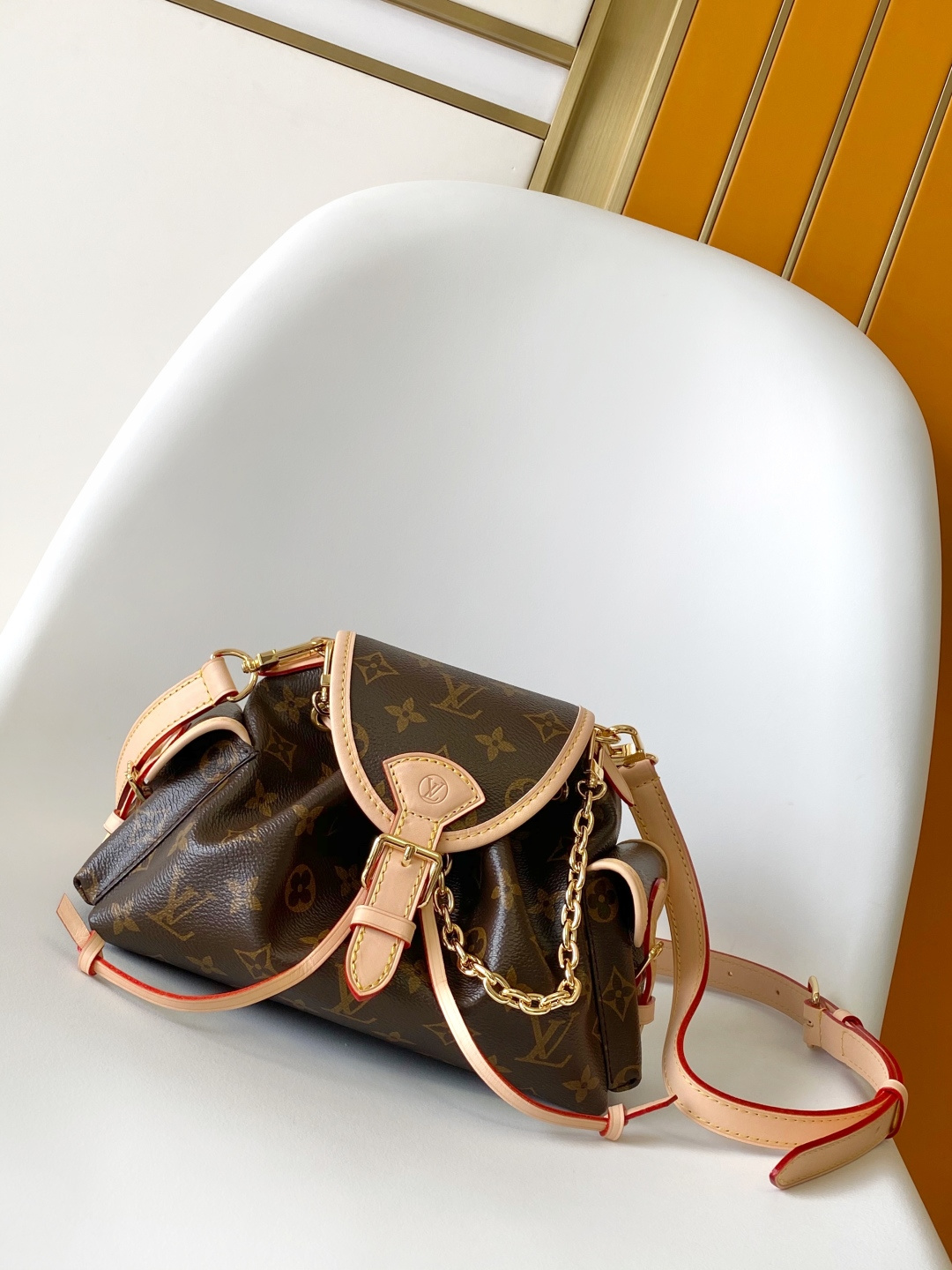 Louis Vuitton Odysée Monogram Canvas Bag with Chain - Stylish & Functional