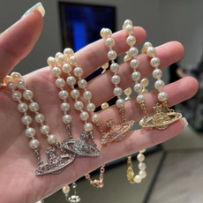 西太后土星镶钻珍珠项链𝐕𝐢𝐯𝐢𝐞𝐧𝐧𝐞 𝐖𝐞𝐬𝐭𝐰𝐨𝐨𝐝🪐vivienne westwood英国时装设计 西太后土星镶钻珍珠项链𝐕𝐢𝐯𝐢𝐞𝐧𝐧𝐞 𝐖𝐞𝐬𝐭𝐰𝐨𝐨𝐝🪐vivienne westwood英国时装设计