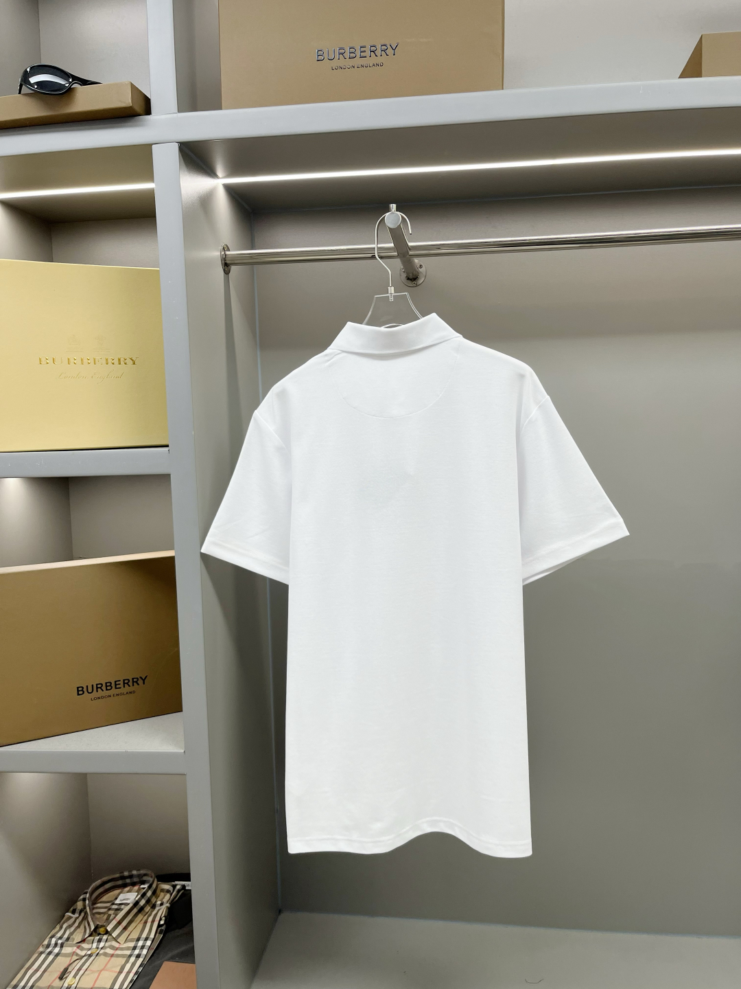 Prada Polo de Manga Corta con Cierre y Logo Triangular para Hombre y Mujer 9 cmp i1746486953317 1297 0 7