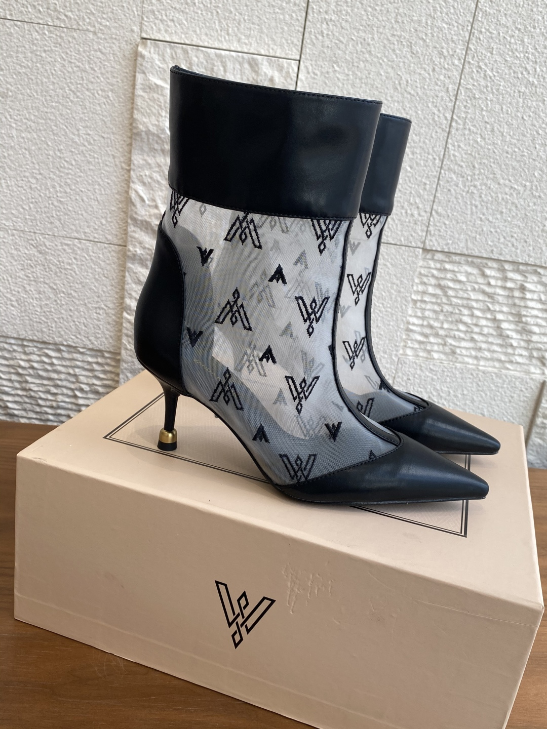 Fashion Alert: VANDA NOVAK’s Stylish Embroidered Boots with Zirconium Details