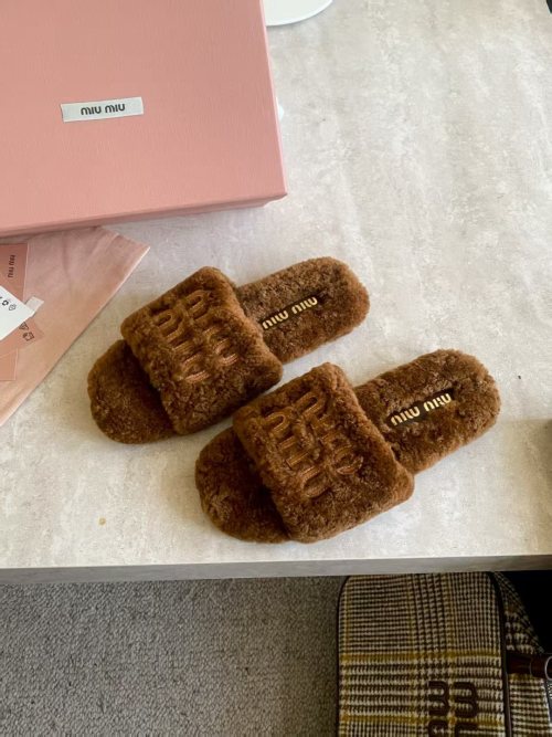 Miu Miu Shearling Logo Slides - Cozy & Chic, Perfect for Fall & Winter 1 Miu Miu Shearling Logo Slides - Cozy & Chic, Perfect for Fall & Winter