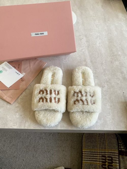 Miu Miu Shearling Logo Slides - Comfortable & Stylish Indoor/Outdoor Slippers 1 Miu Miu Shearling Logo Slides - Comfortable & Stylish Indoor/Outdoor Slippers