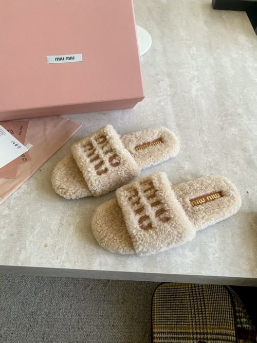 Miu Miu Shearling Slides: Cozy & Chic Indoor/Outdoor Slippers - Multiple Colors 1 Miu Miu Shearling Slides: Cozy & Chic Indoor/Outdoor Slippers - Multiple Colors