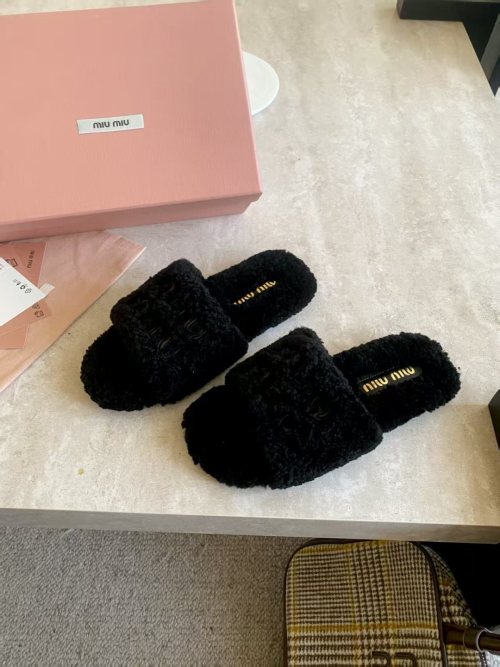 Miu Miu Fuzzy Shearling Slides - Cozy, Stylish, and Comfortable Slippers 1 Miu Miu Fuzzy Shearling Slides - Cozy, Stylish, and Comfortable Slippers
