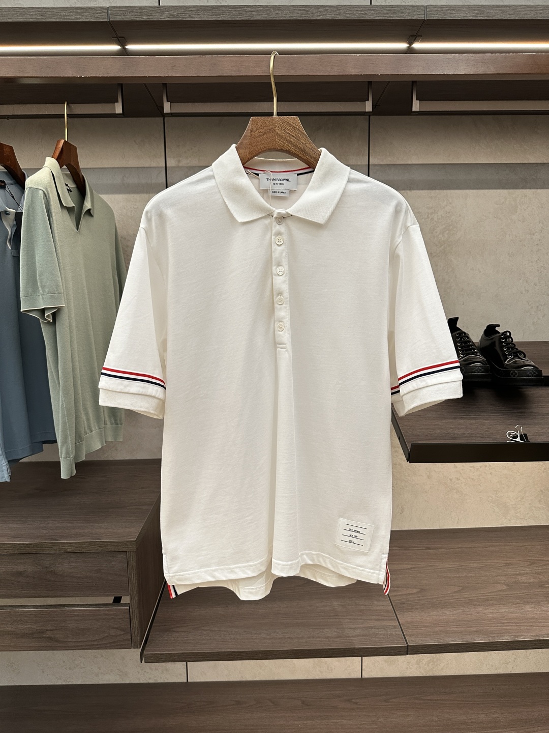 Thom Browne White Cotton Polo Shirt with Signature Stripe Detail 2 cmp i1750056690841 805 0 0