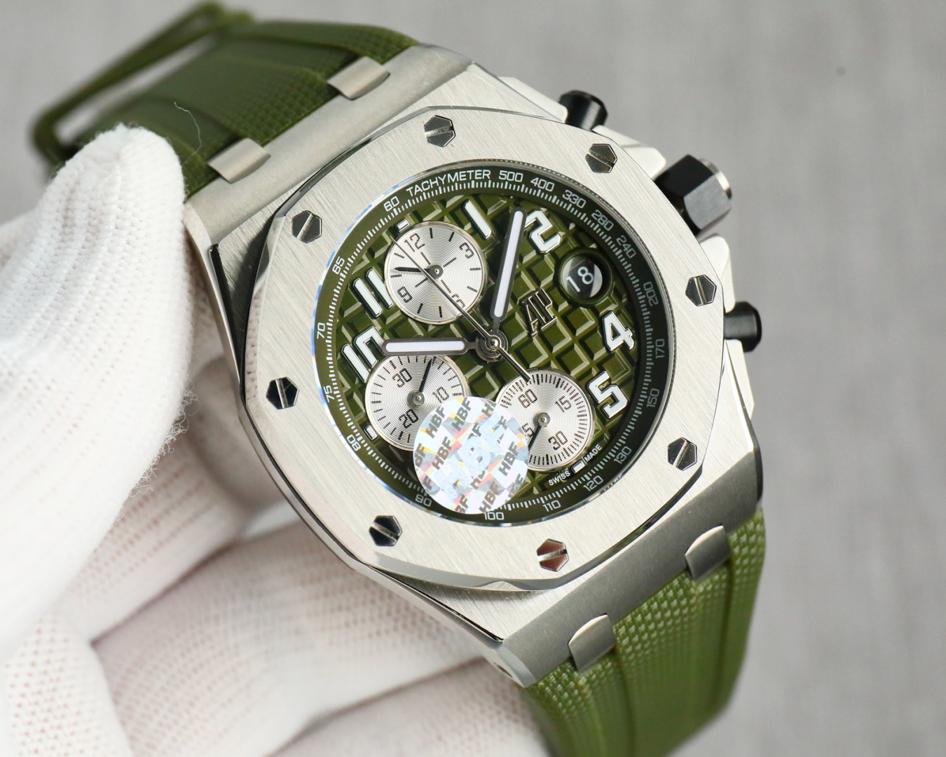 NO:882101,Belts, tapes, steel belts produced by HBF FACTORY Audemars Piguet AP A42 Royal Oak Offshore Series 26238: The top-notch work to eliminate fakes at first glance. Based on the original JF factory, we have devoted ourselves to research and development to break through barriers. 'Break the original blockade technology, synchronize the original exclusive chronograph model to loosen the headband' to maximize the fit of the wrist, greatly improving the comfort of wearing.  At the same time, it also eliminates the embarrassing situation of fake ones at a glance. The HBF factory truly considers the perspective of every watch lover who likes watches. 2. Using the latest CNC-level polishing technology, every angle of the entire watch case is perfectly processed. 3. Each hexagonal screw is on the same plane as the watch frame, and does not accept the slightest protrusion or depression, truly interpreting what is the top replica art.  4. The dial uses Audemars Piguet's classic large checkered pattern as the background, with a clear-cut grid arrangement. It has been perfectly polished to fully reflect the craftsmanship of the craftsman.  5. The mirror adopts double-sided sapphire lens and natural fluorine rubber belt. 6. The movement adopts the original 3126 chronograph movement, with 12-digit small seconds, 12-hour chronograph and 30-minute chronograph at 6 o'clock and 9 o'clock. It perfectly restores all the functions of the original version. Each watch has been manually QC to ensure the stability of the movement. It is truly impeccable and the best luxury recommendation for gift-giving. Please look for the exclusive quality of HBF, audemars19860909HBF 出品 皮带 胶带 钢带款  HBF FACTORY 爱彼 AP A42 皇家橡树离岸型系列26238:封顶之作 杜绝一眼假”在ＪＦ厂原有的基础上 潜心研发 突破壁垒 “打破原装封锁技术,同步原装独家计时码表款可松动头粒”使上手最大程度贴合手腕,大大提高了佩戴的舒适 同时也杜绝一眼假的尴尬处境.HBF厂真正做到从每一个喜欢手的表友角度考虑 2.采用最新CNC级别的打磨技术,将整个表壳的个个角度完美处理,3.每颗六角螺丝都与表框处于同一平面上,不接受一丝一毫的凸显与凹陷,真正诠释了何为顶级复刻艺术 4.表盘以爱彼经典的大格纹为背景,层次分明的方格排列,经过完美打磨,将匠人的工艺体现的淋漓尽致 5.镜面采用双面蓝宝石镜片,天然氟橡胶皮带,6.机芯采用原装3126的计时机芯,十二位的小秒,6点钟位和九点位的12小时计时与30分钟计时,完美的还原了原版的所有功能,每块手表都经过人工QC确保机芯的稳定性,真正做到无可挑剔送礼最佳奢华推荐请认准HBF独家品质,,audemars,Watch