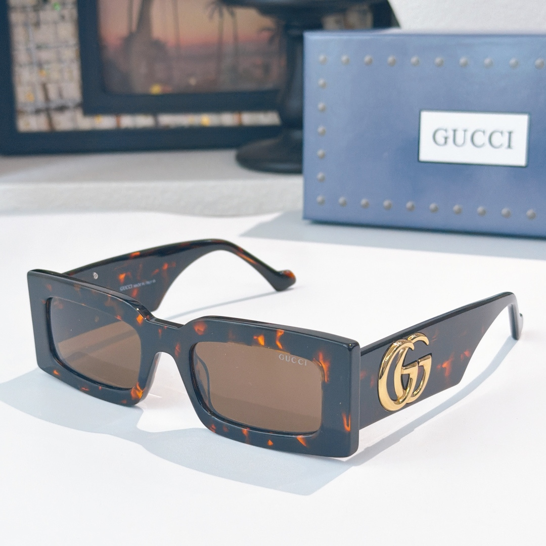 Gucci GUCC*
