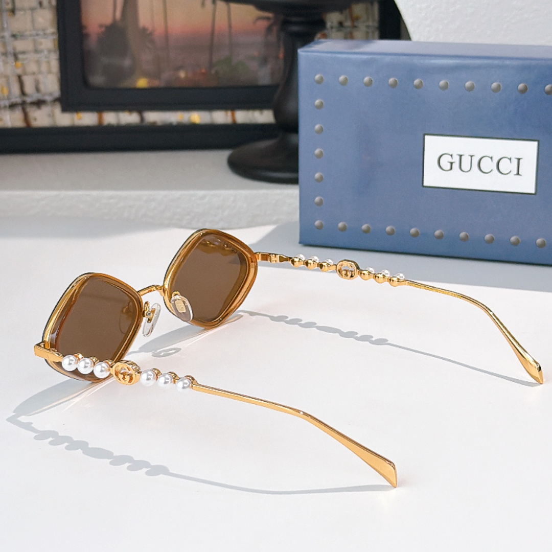 Gucci GUCC*