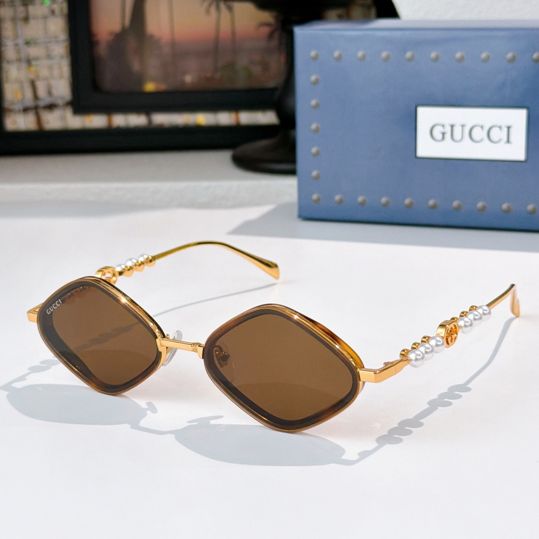Gucci GUCC*