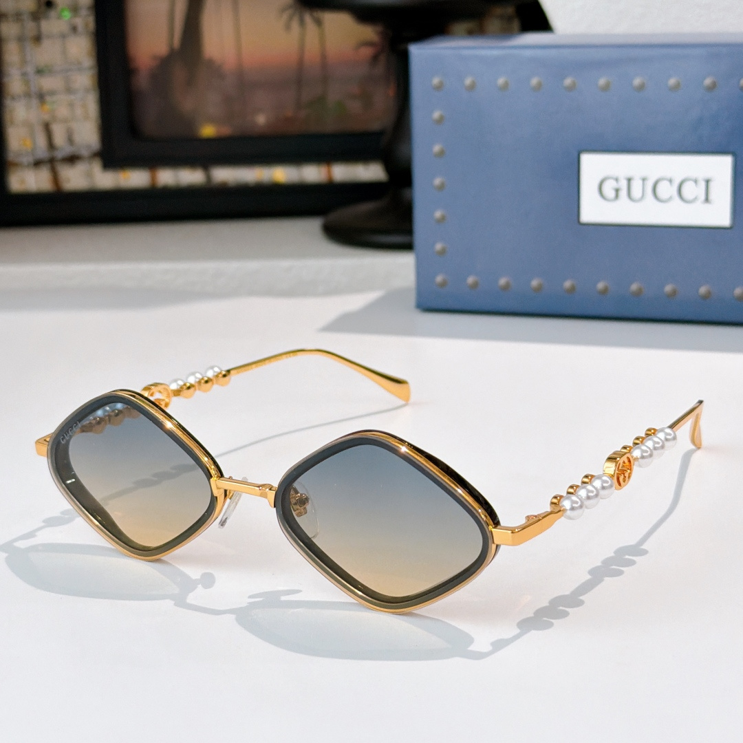 Gucci GUCC*