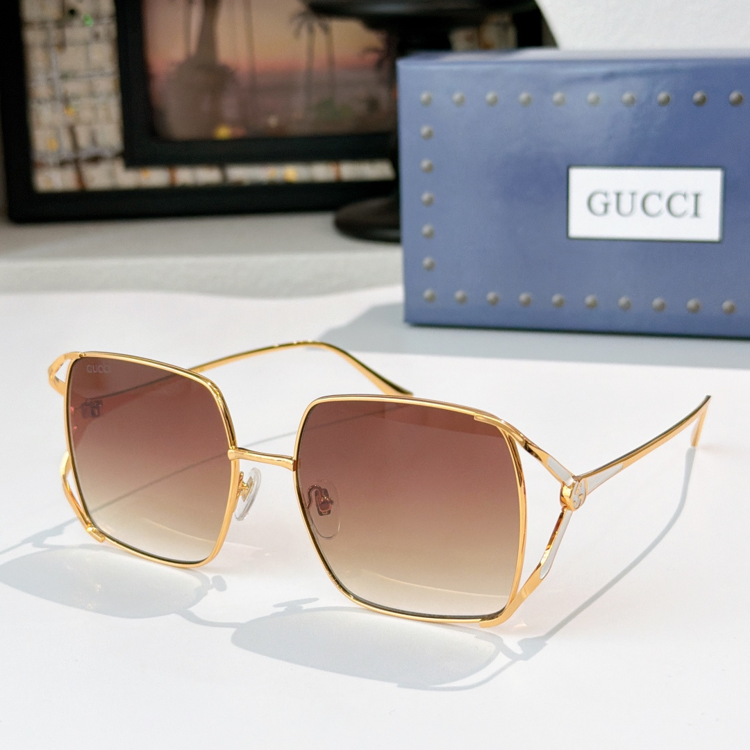 Gucci GUCC*
