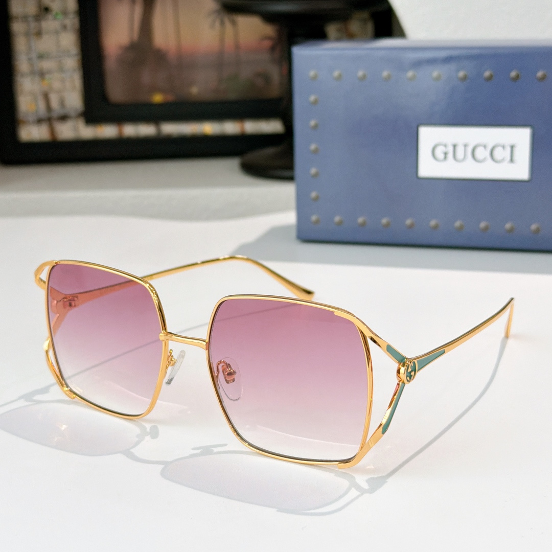 Gucci GUCC*