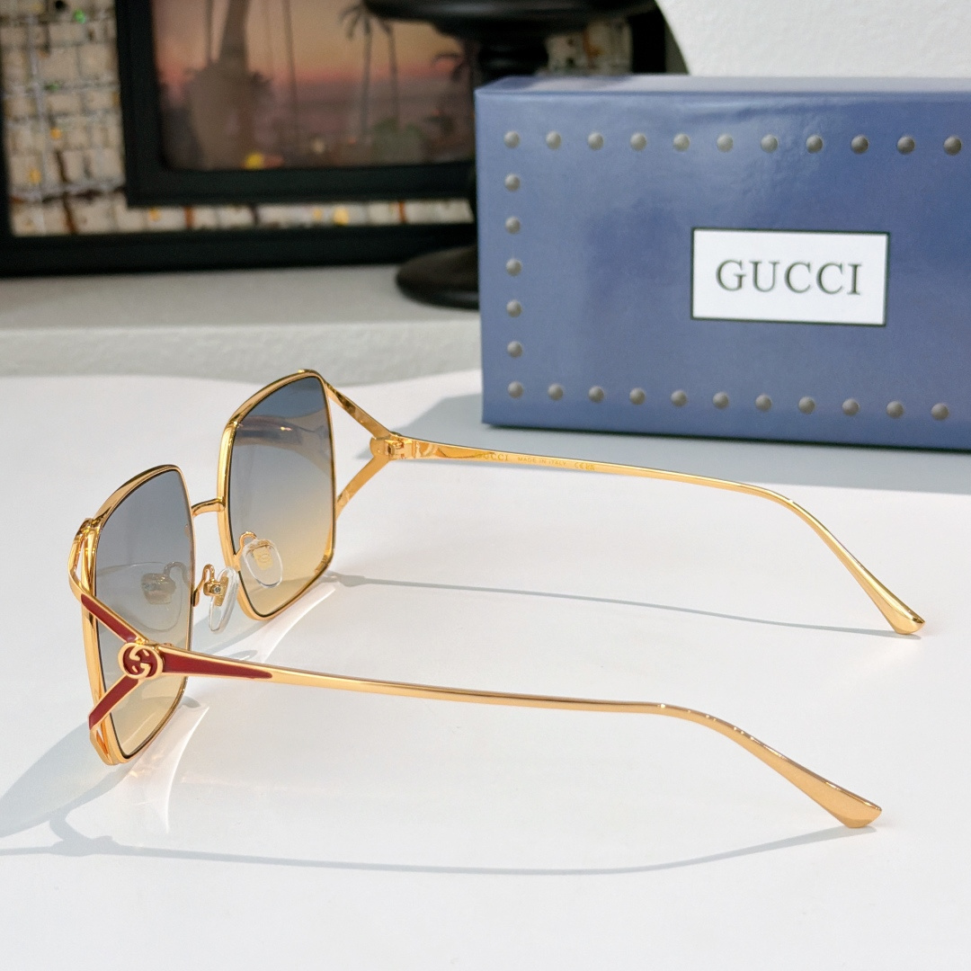 Gucci GUCC*