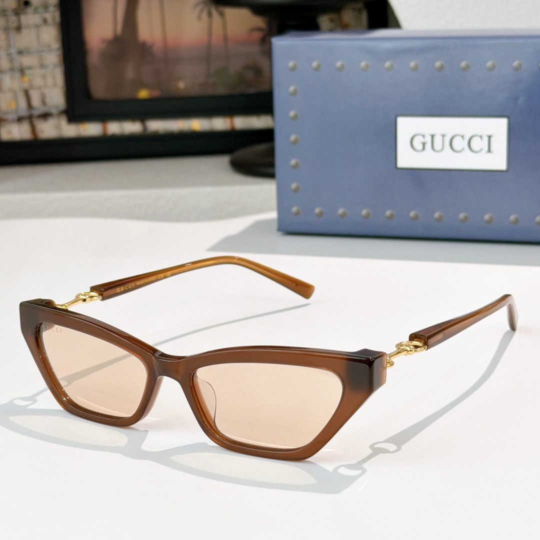 Gucci GUCCI*