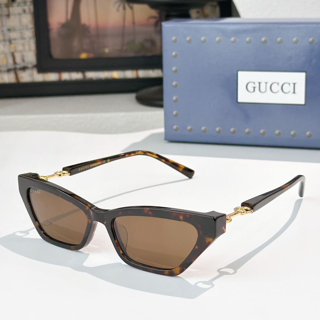 Gucci GUCCI*