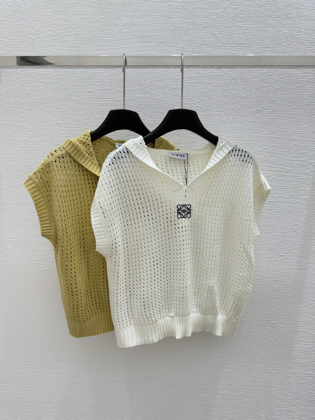 NO:417771,LO Home Early Spring New Hooded Hollow Knitted Vest Color White Yellow Size 36.38.40, Hats,alexander wang19860909LO家  早春新款 连帽镂空针织背心 颜色白色 黄色 尺码36.38.40,,hats,alexander wang,Women's clothing
