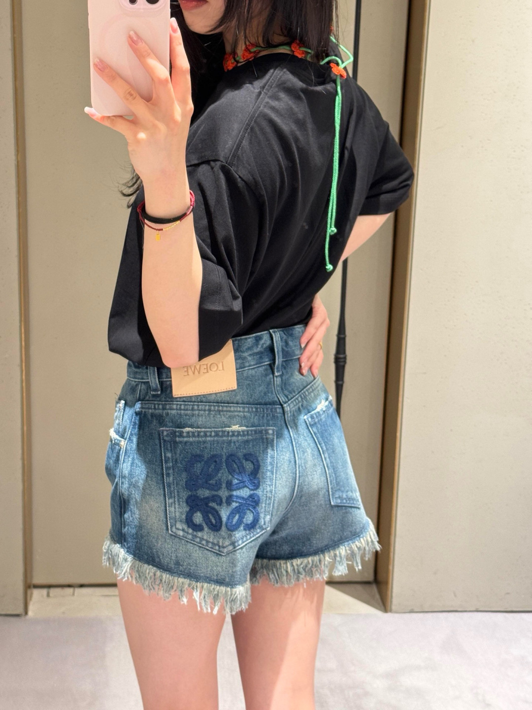 LOEWE Denim Shorts with Frayed Hem and Logo Detail - Chic and Trendy 9 cmp i1749142808862 8846 0 4