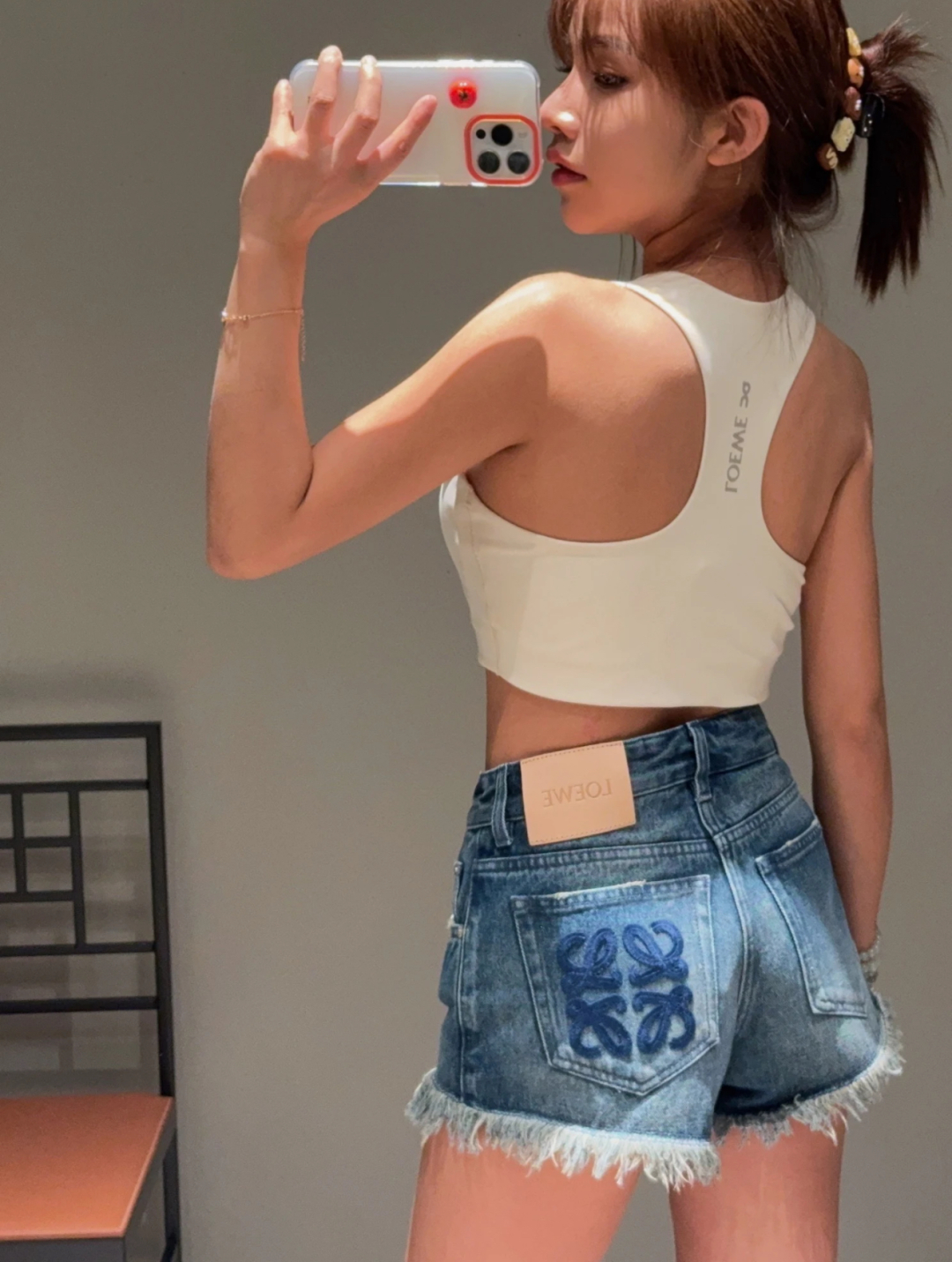 LOEWE Denim Shorts with Frayed Hem and Logo Detail - Chic and Trendy 2 cmp i1749142809557 4850 0 0
