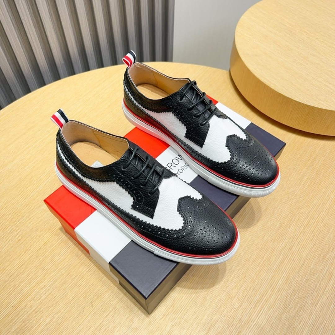 Thom Browne Leather Wingtip Oxford Shoes with Signature Stripe - Classic Style 1 Thom Browne Leather Wingtip Oxford Shoes with Signature Stripe - Classic Style
