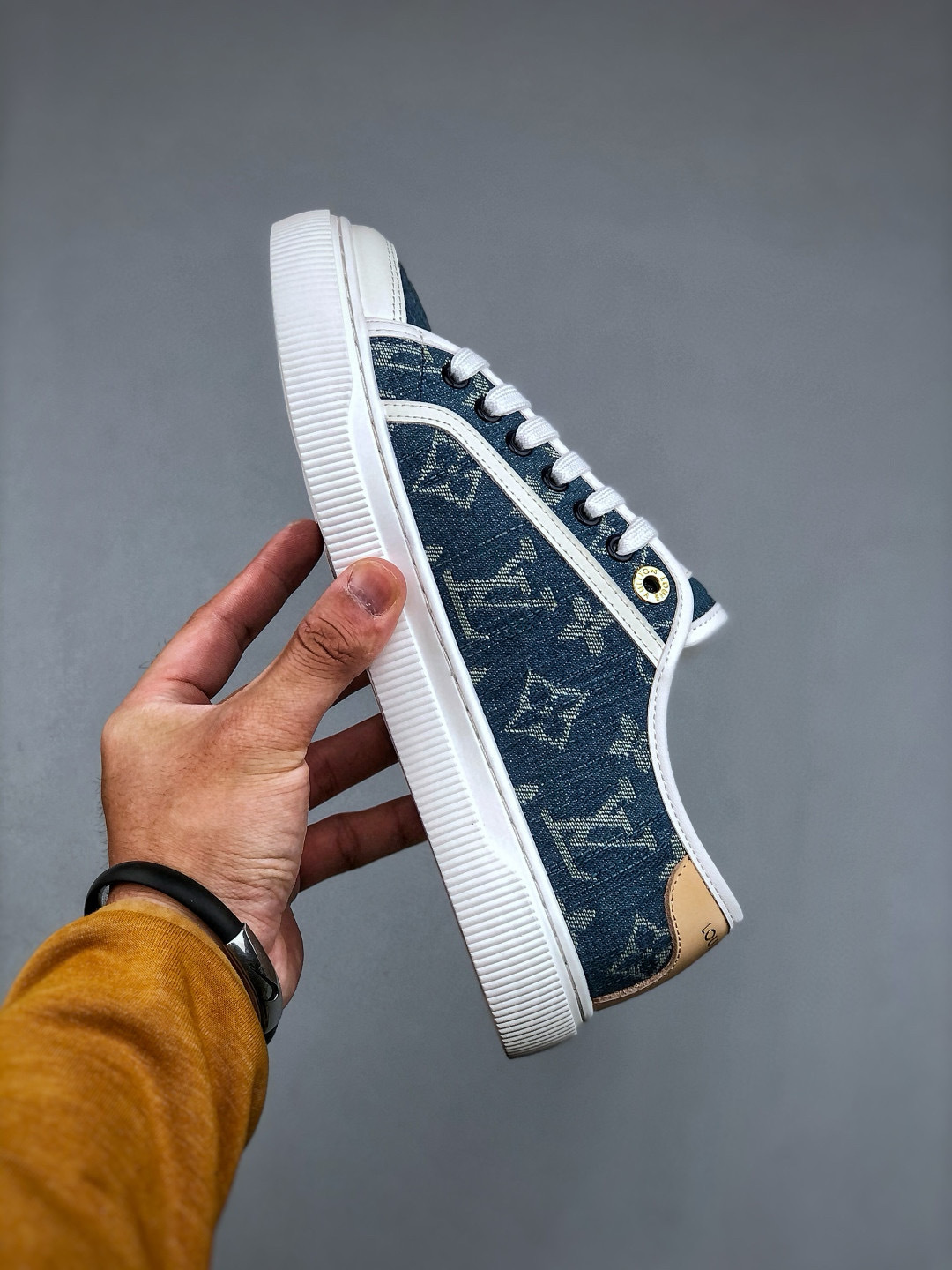 Louis Vuitton Lagoon Denim Sneaker: Embossed Canvas, Retro Design, and Comfort 3 cmp i1746551776080 417 0 1
