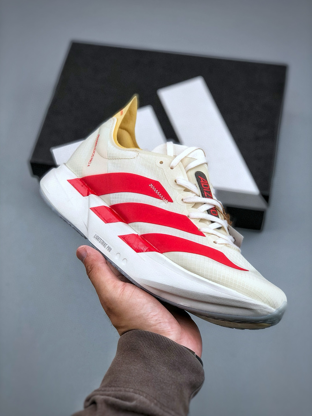 Adidas Adizero Adios 4: Breathable, Lightweight Low-Top Running Shoes 5 cmp i1746898473088 5690 0 3