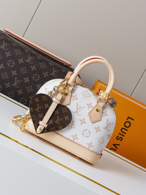 Louis Vuitton Alma Mini White Monogram Canvas Bag with Heart Charm 1 Louis Vuitton Alma Mini White Monogram Canvas Bag with Heart Charm