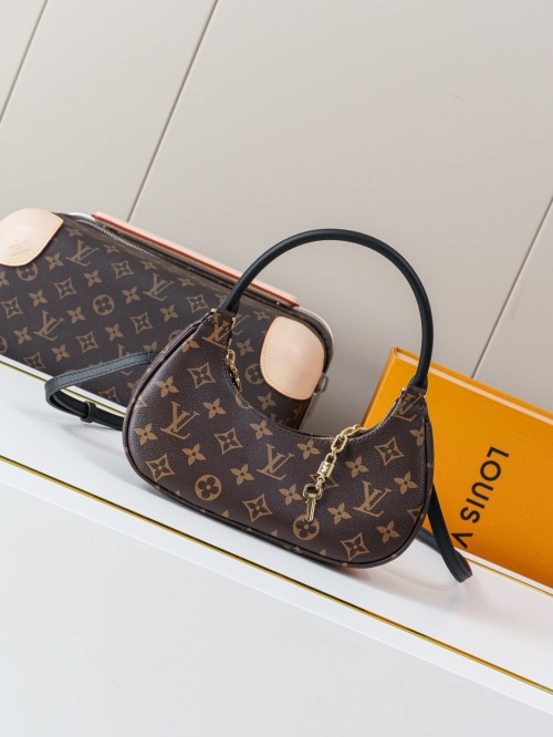 Louis Vuitton Catchy Small Handbag Monogram Coated Canvas with Leather Trim 1 Louis Vuitton Catchy Small Handbag Monogram Coated Canvas with Leather Trim