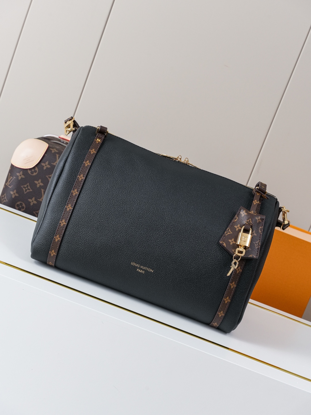 Louis Vuitton Express Medium Black Leather Handbag with Monogram Accents