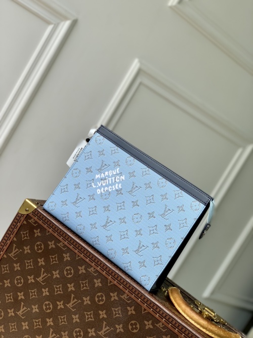 Louis Vuitton Pochette Voyage MM Blue Monogram Heritage Canvas Clutch 1 Louis Vuitton Pochette Voyage MM Blue Monogram Heritage Canvas Clutch
