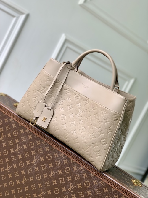 Louis Vuitton Avenue MM Tote Bag in Apricot Monogram Embossed Leather 1 Louis Vuitton Avenue MM Tote Bag in Apricot Monogram Embossed Leather