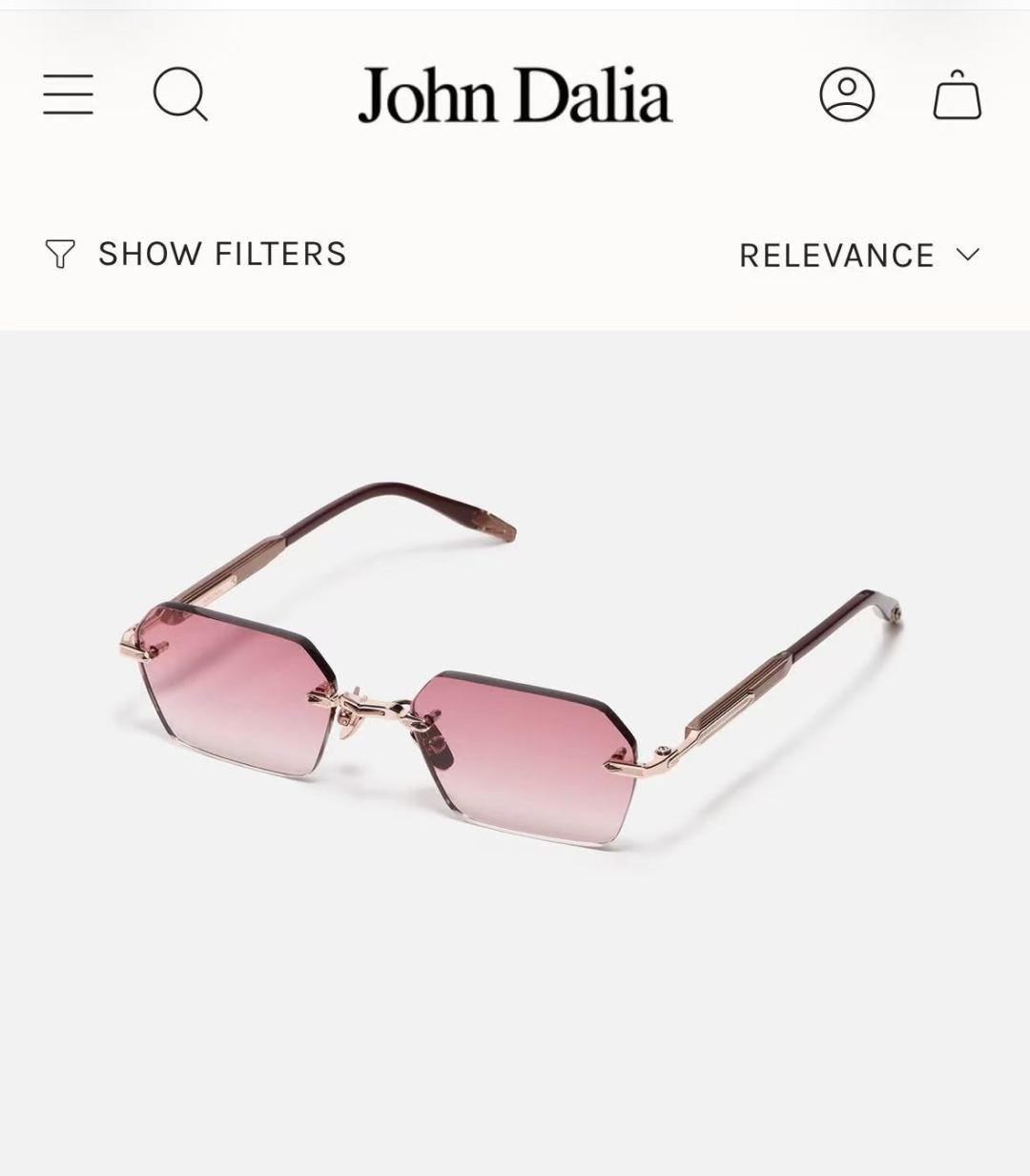 JOHN DALIA R03眼镜，尽显永恒优雅——这款男女皆宜的无框眼镜，兼具精致与舒适。圆角矩形镜框轮廓，宽阔的凹槽鼻
