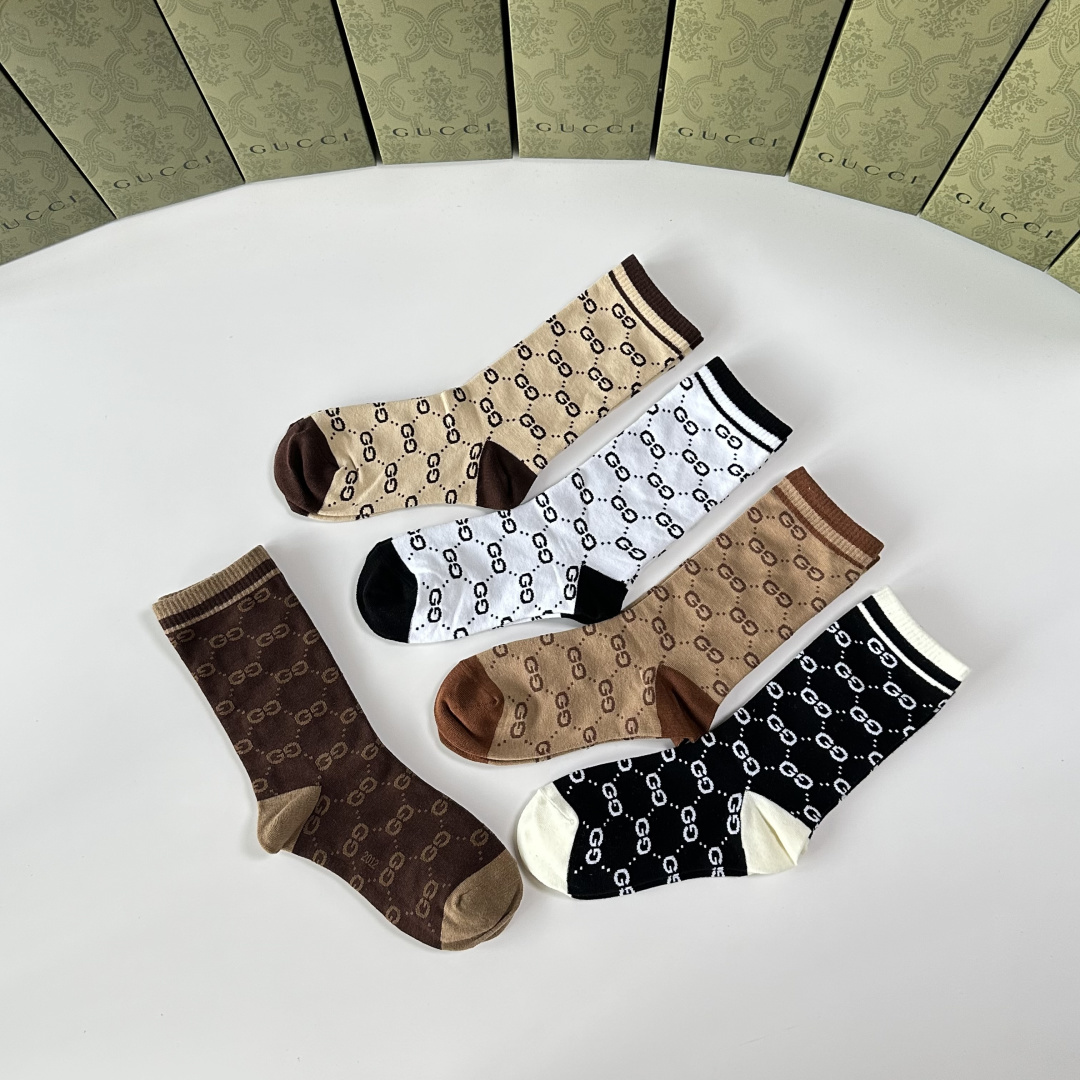 💛配专柜包装Gucci（古驰）新款中长款堆堆袜袜子！一盒五双，专柜同步筒袜袜子，💛大牌出街，潮人必备🔥超