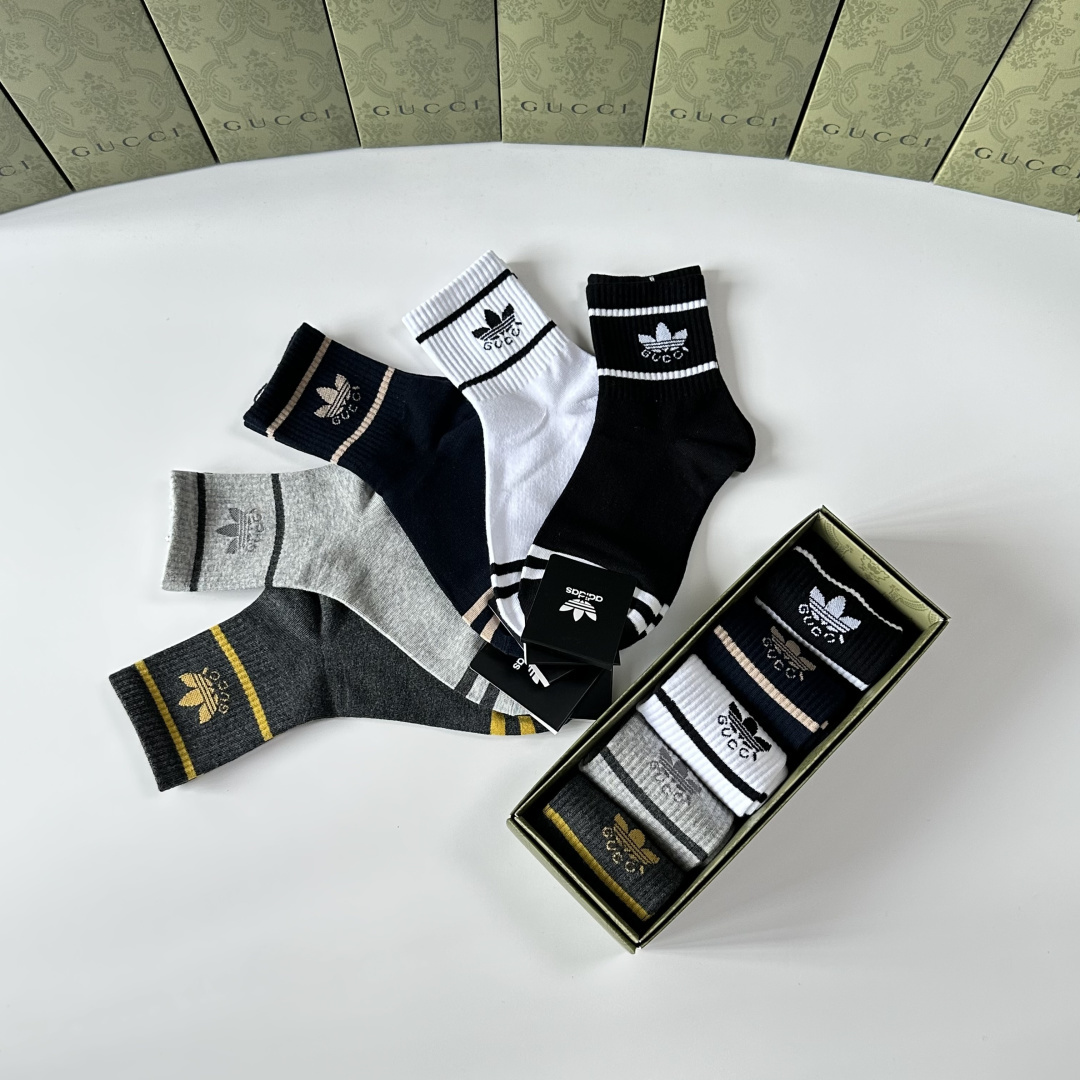 💛配包装Gucci（古驰）新款中长款堆堆袜袜子！一盒五双， 专柜同步筒款袜子，💛大牌出街，潮人必备🔥超好
