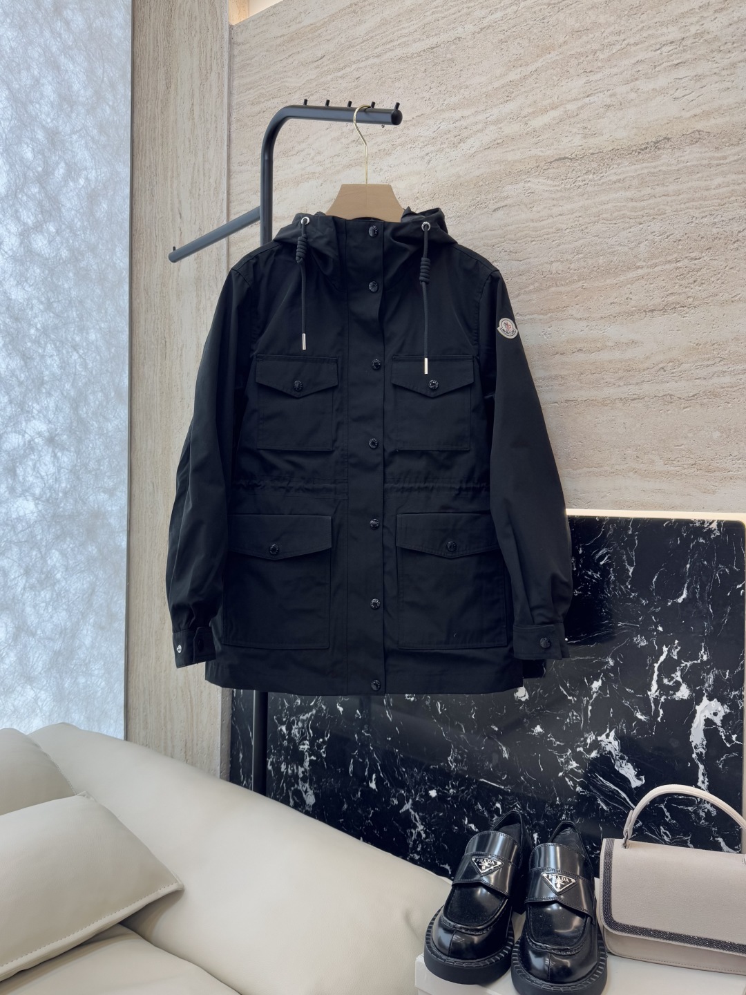 Moncler Theberon Pike Coat: Stylish, Functional, High-Quality Design with Cap Detail.