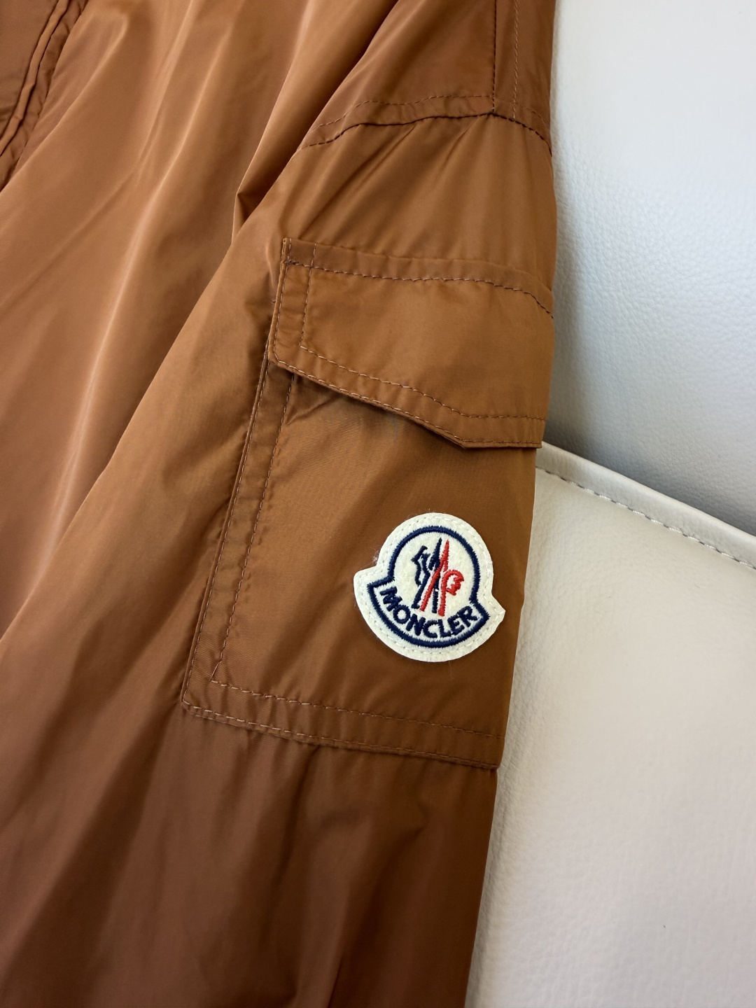 M2144#新款外套。Mon蒙口 抽绳设计 荷叶裙摆 长袖拉链款夹克外套 黑色 藏青色 杏色 焦糖色 1