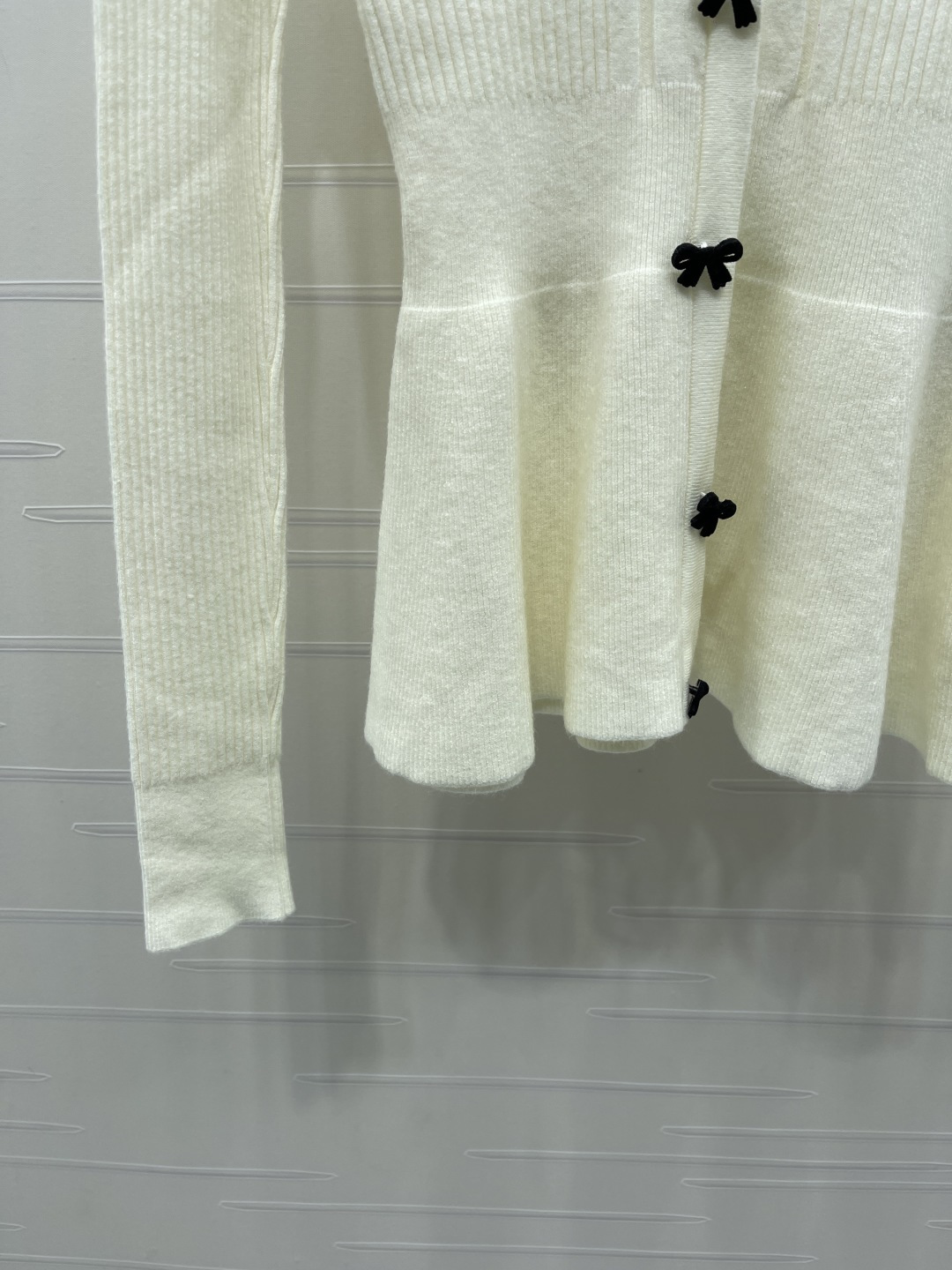 chanel logo bow button peplum knit cardigan