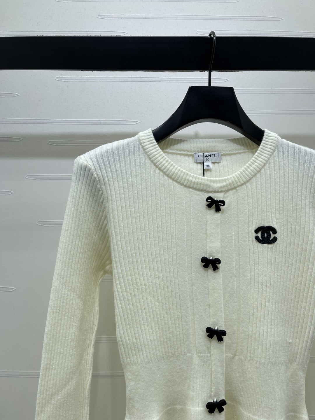chanel logo bow button peplum knit cardigan