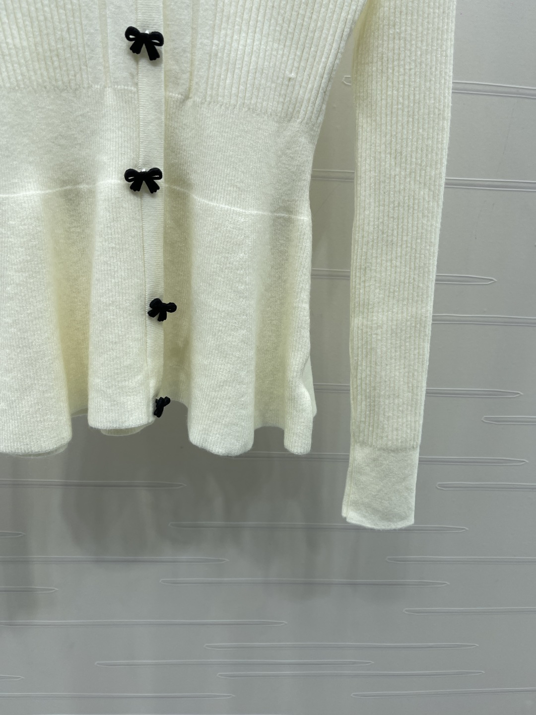 chanel logo bow button peplum knit cardigan