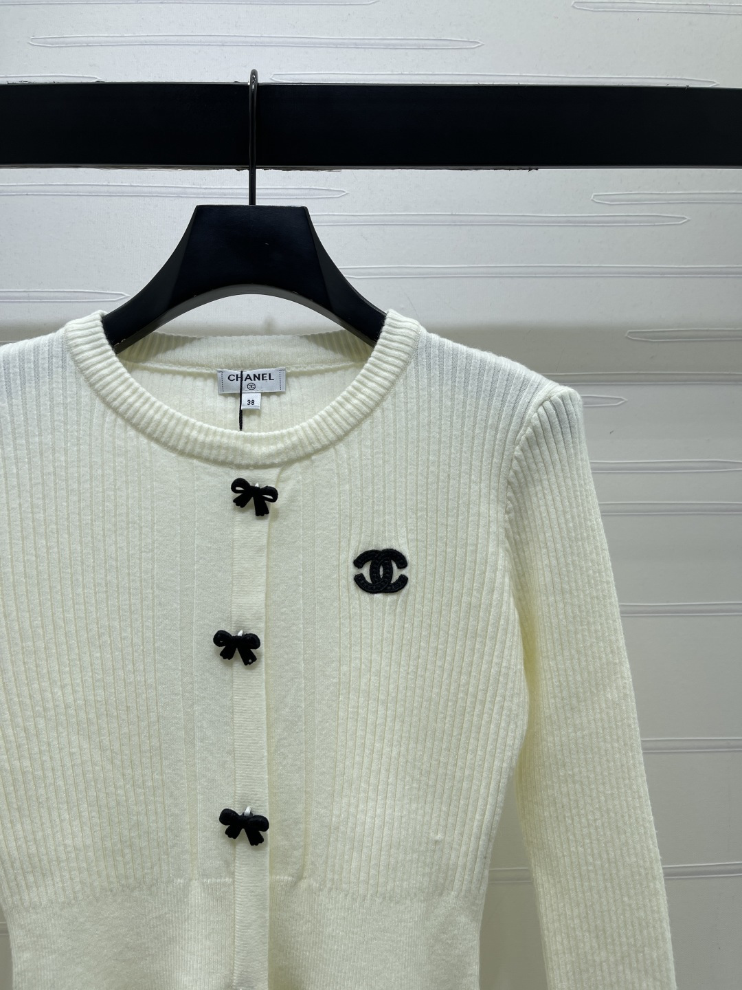 chanel logo bow button peplum knit cardigan