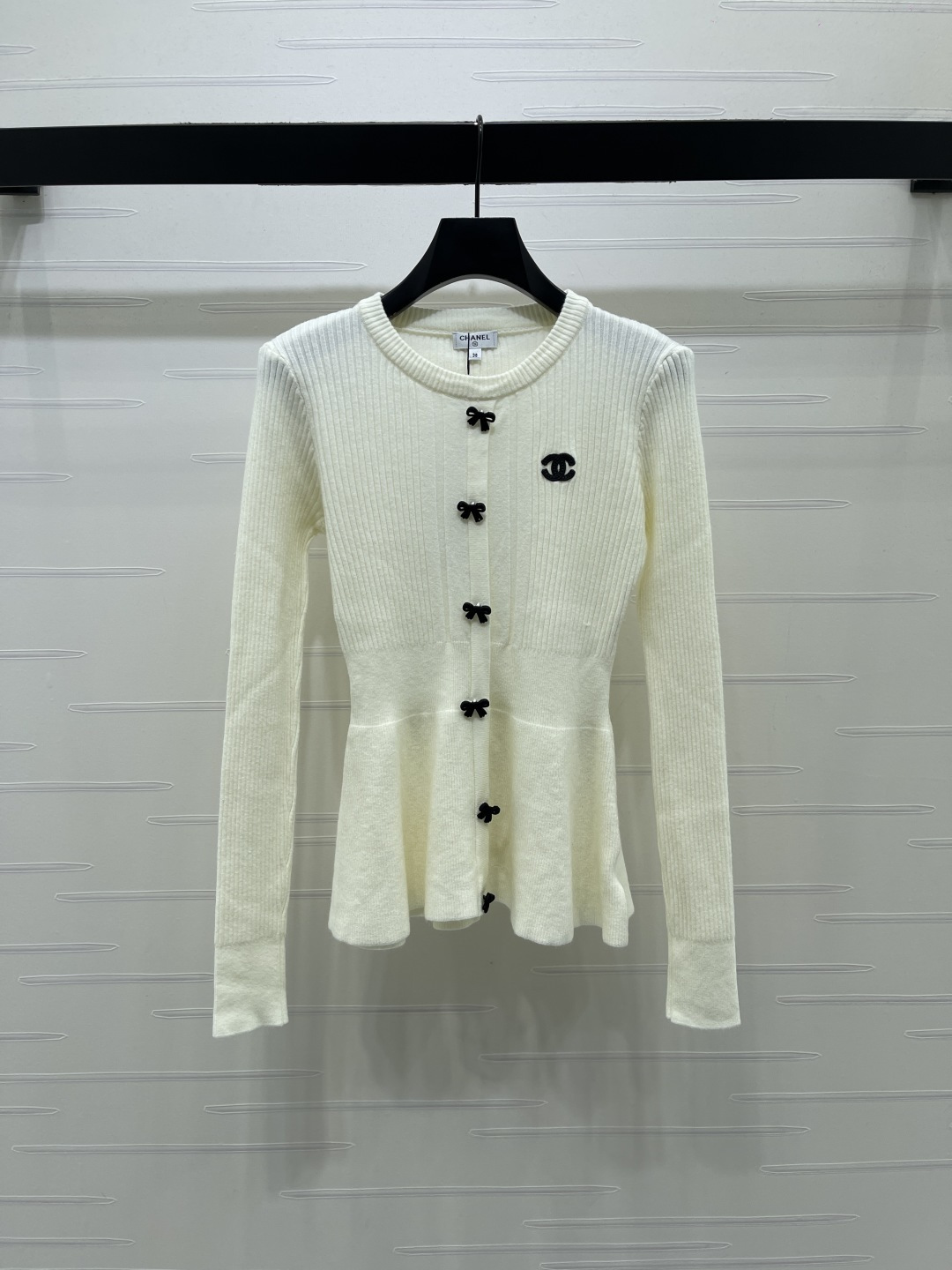 chanel logo bow button peplum knit cardigan
