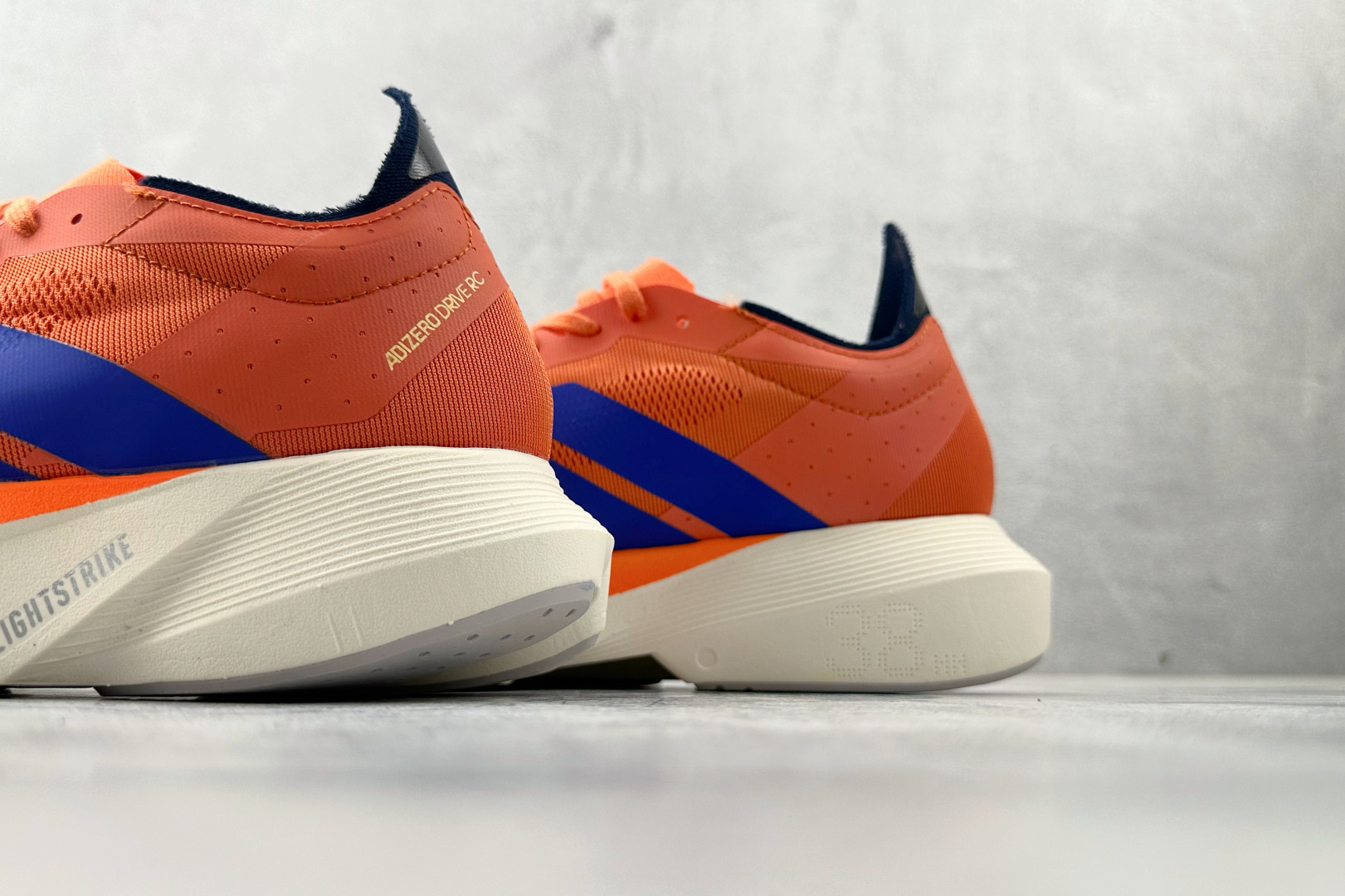 adidADIZERO DRIVE RC 橙色 JH5695